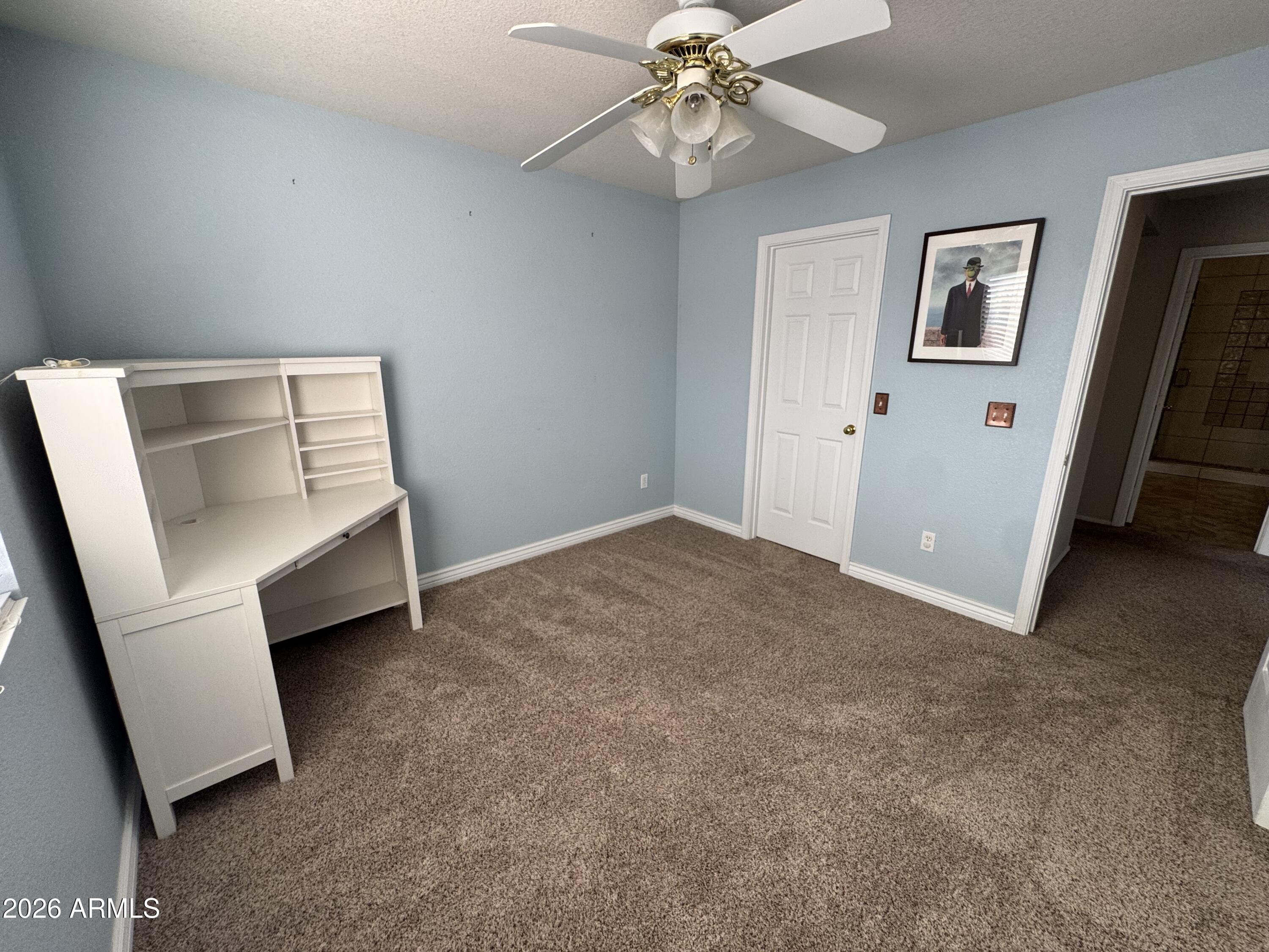 3750 East Orchid Lane Gilbert, AZ 85296 - Photo 28 of 43 a view of an empty room with a window