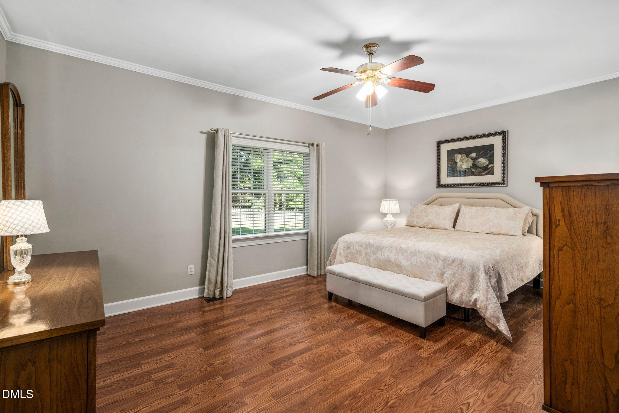 1405 October Road Raleigh, NC 27614 - Photo 14 of 40 a spacious bedroom with a bed and a window