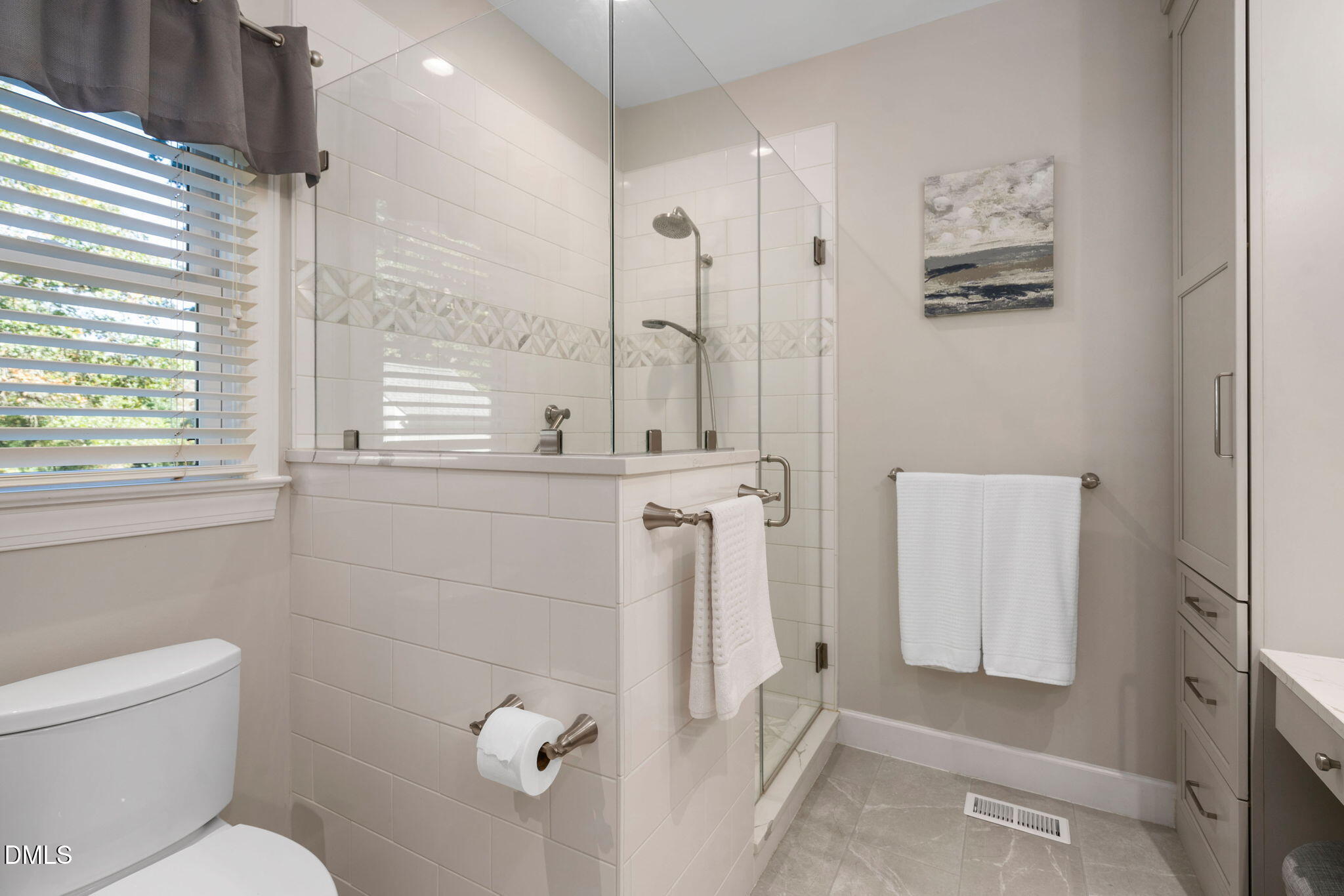1405 October Road Raleigh, NC 27614 - Photo 17 of 40 a bathroom with a toilet sink and tub