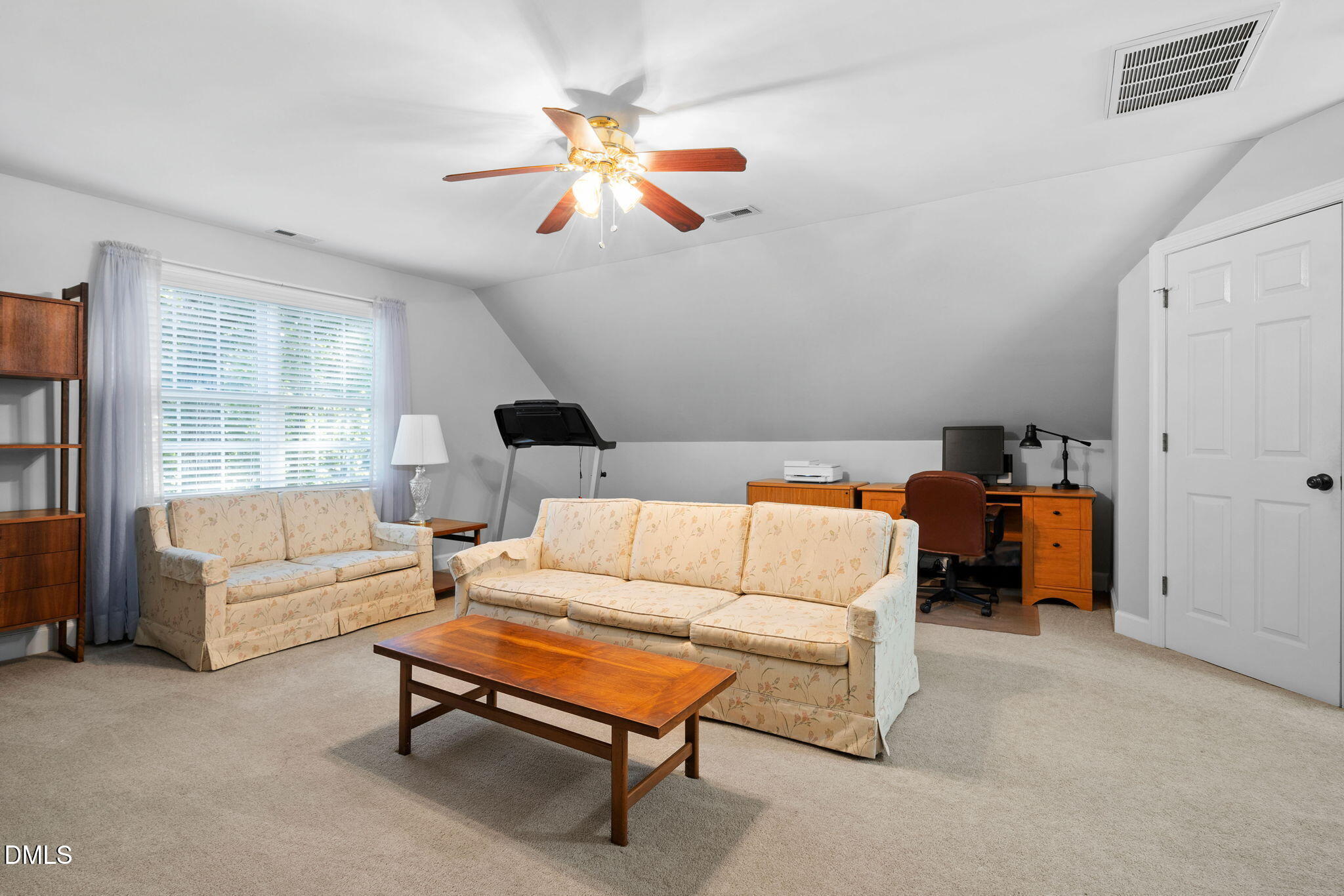 1405 October Road Raleigh, NC 27614 - Photo 25 of 40 a bedroom with furniture and a chandelier