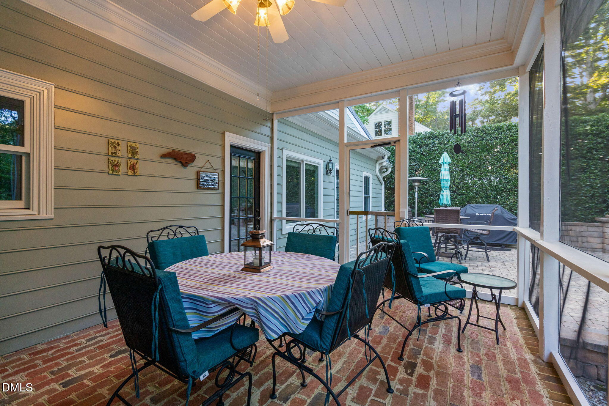 1405 October Road Raleigh, NC 27614 - Photo 27 of 40 a view of a patio with a table and chairs