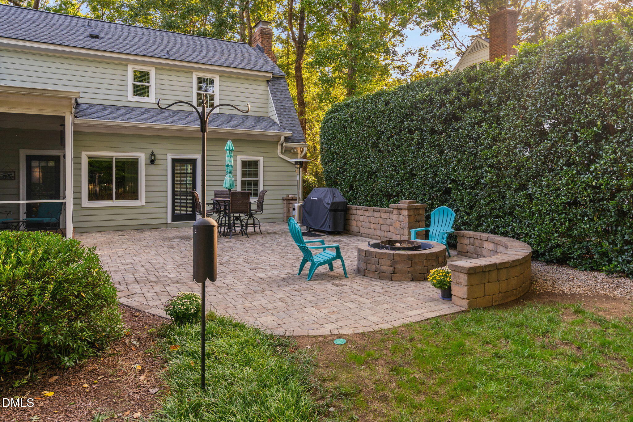 1405 October Road Raleigh, NC 27614 - Photo 28 of 40 a view of a house with backyard sitting area and garden