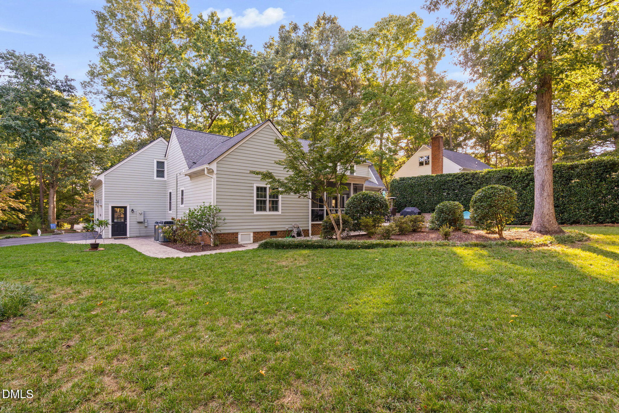 1405 October Road Raleigh, NC 27614 - Photo 32 of 40 a view of a house with backyard and sitting area