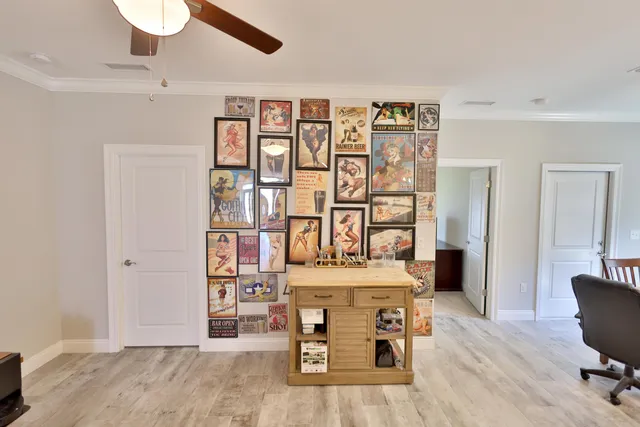 a view of a hardwood floor and workspace