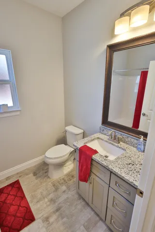 a bathroom with a sink and a toilet