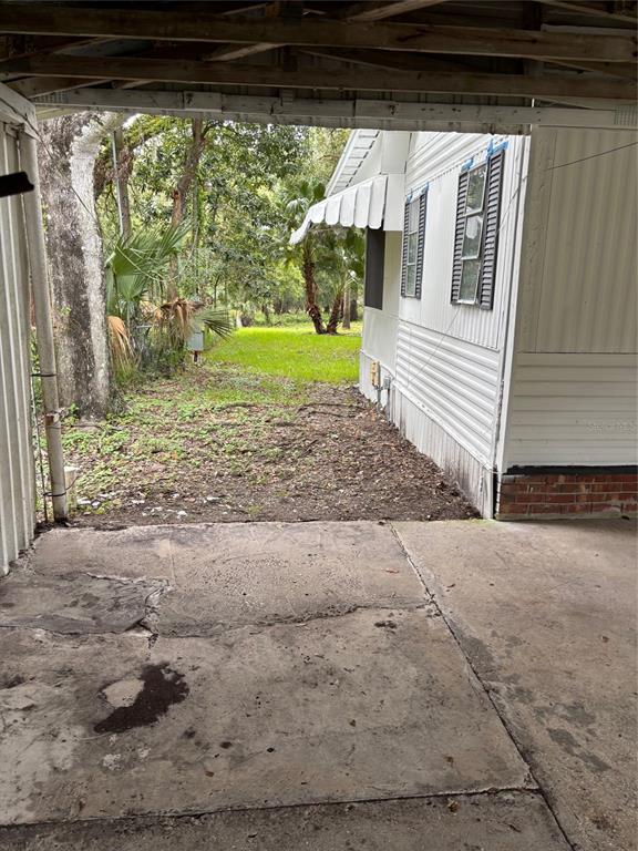 24739 Audrey Road Land O' Lakes, FL 34639 - Photo 14 of 20 a view of a back yard of the house