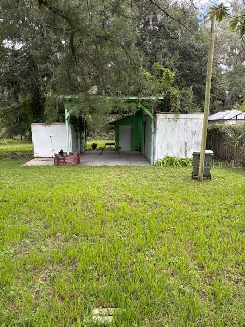 24739 Audrey Road Land O' Lakes, FL 34639 - Photo 16 of 20 a house with a tree in front of it