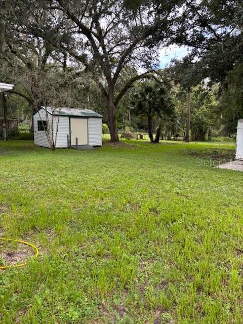 24739 Audrey Road Land O' Lakes, FL 34639 - Photo 17 of 20 a view of a house with backyard and garden