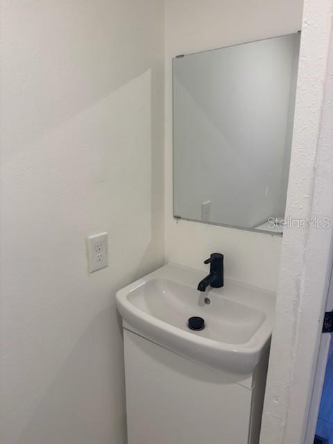 24739 Audrey Road Land O' Lakes, FL 34639 - Photo 9 of 20 a bathroom with a sink and mirror