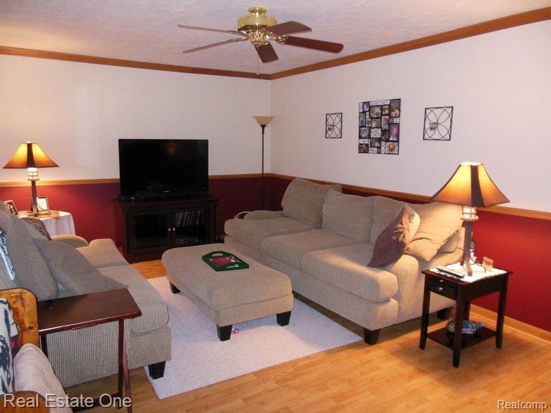 10862 Mcgregor Road Pinckney, MI 48169 - Photo 13 of 49 Crown Molding & Fan