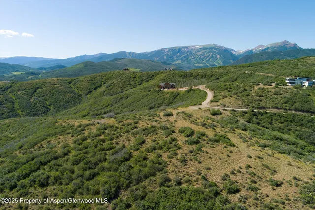 a view of lake and mountain