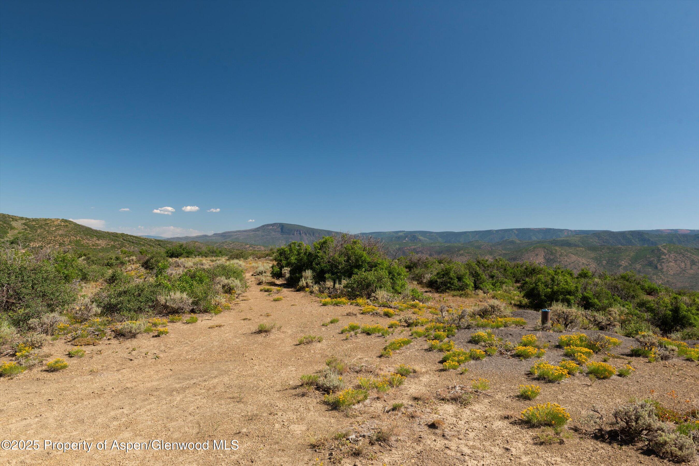 Tbd Monastery Road Snowmass, CO 81654 - Photo 15 of 26 a view of a beach with a snow in the background