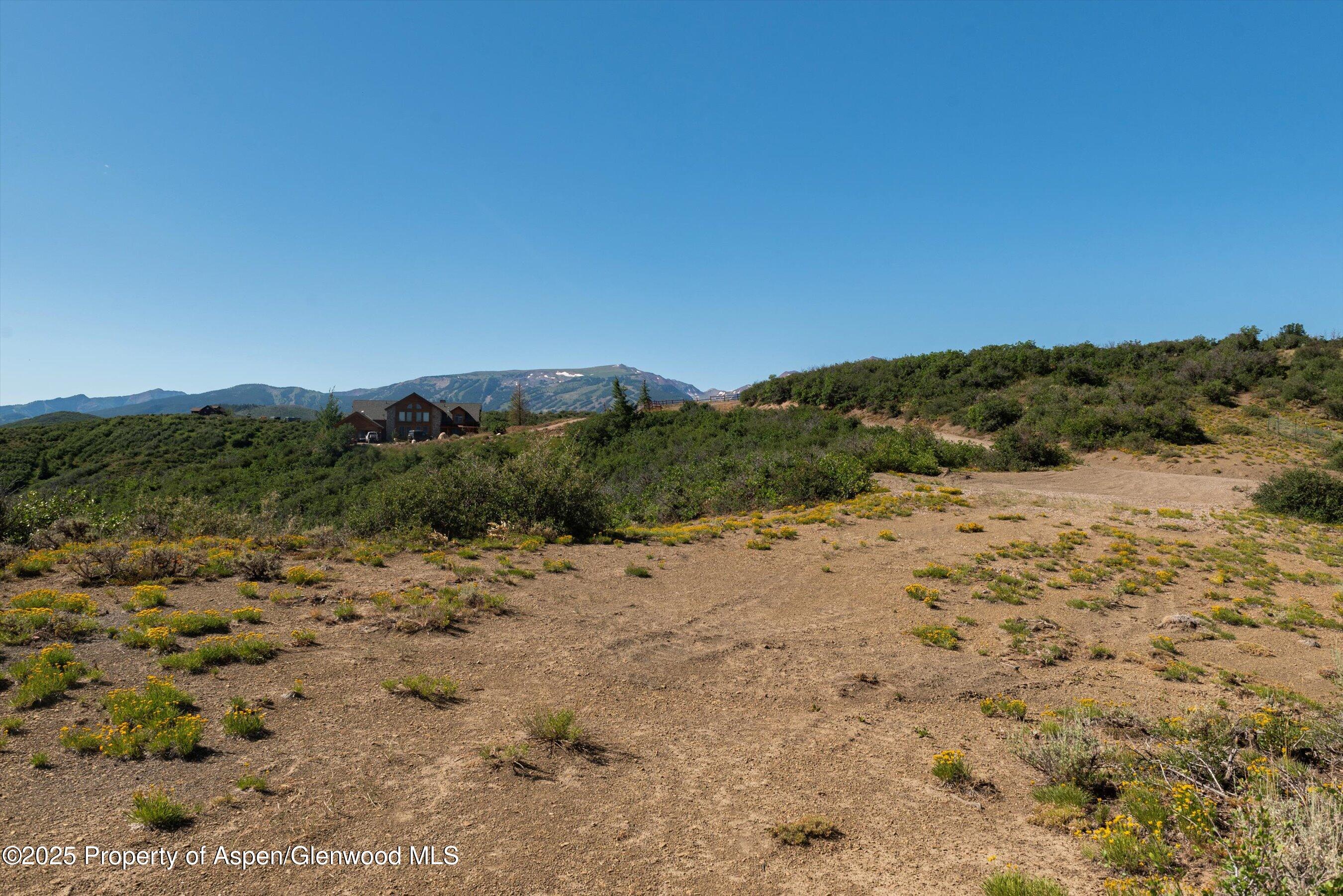 Tbd Monastery Road Snowmass, CO 81654 - Photo 17 of 26 a view of a beach with a mountain in the background