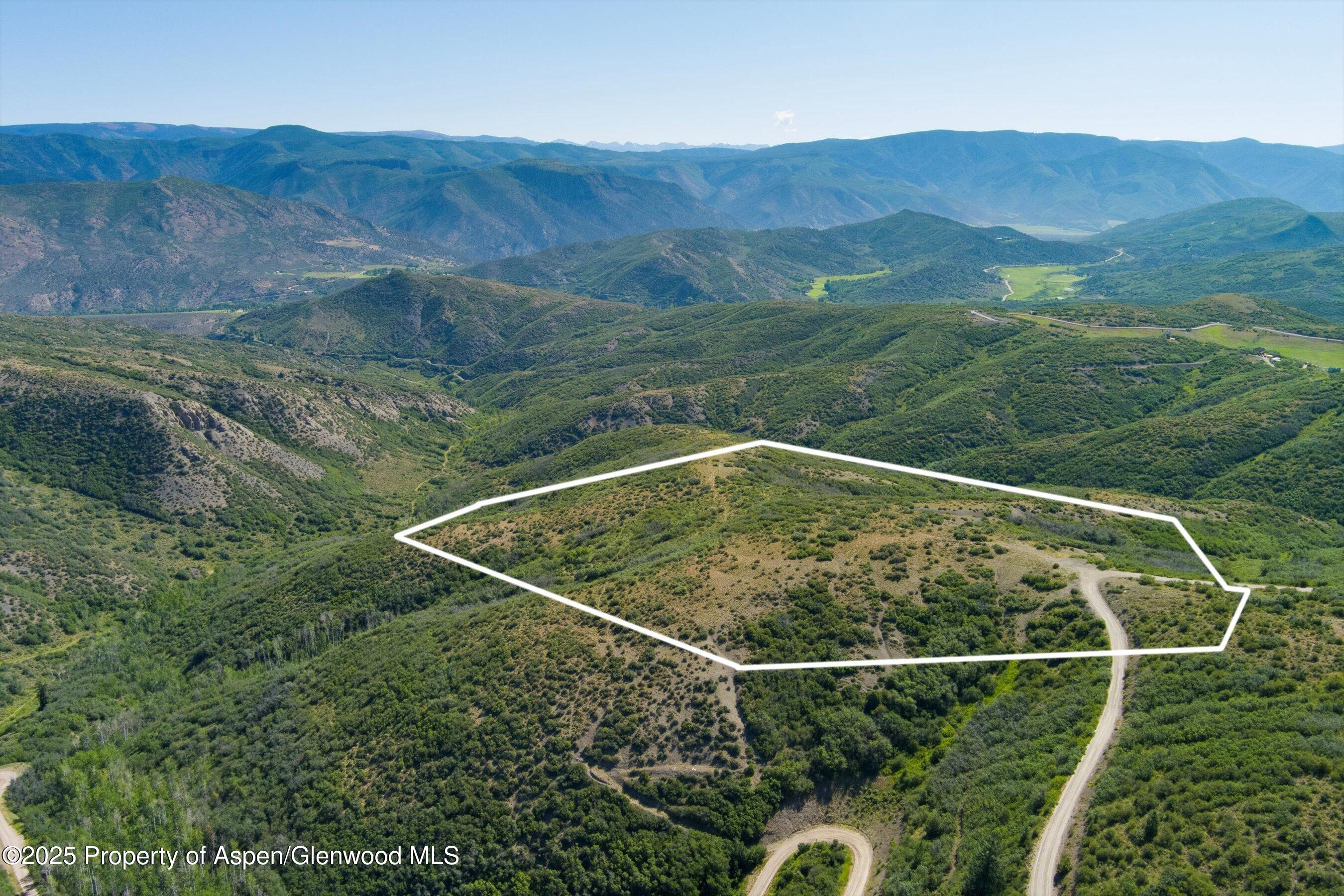 Tbd Monastery Road Snowmass, CO 81654 - Photo 8 of 26 a view of a backyard