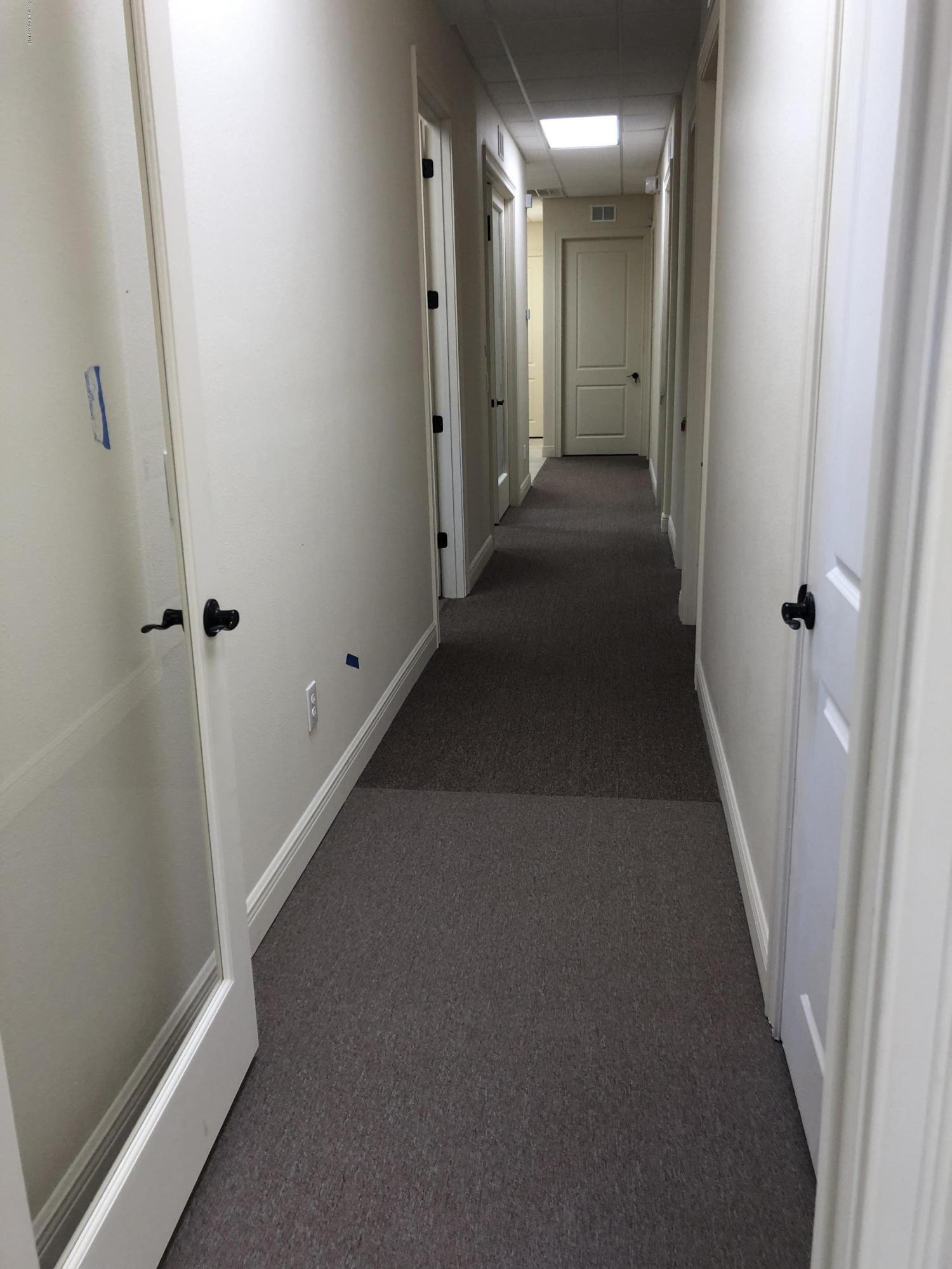 7125 Turner Road, Unit 102 Rockledge, FL 32955 - Photo 2 of 11 a view of a hallway