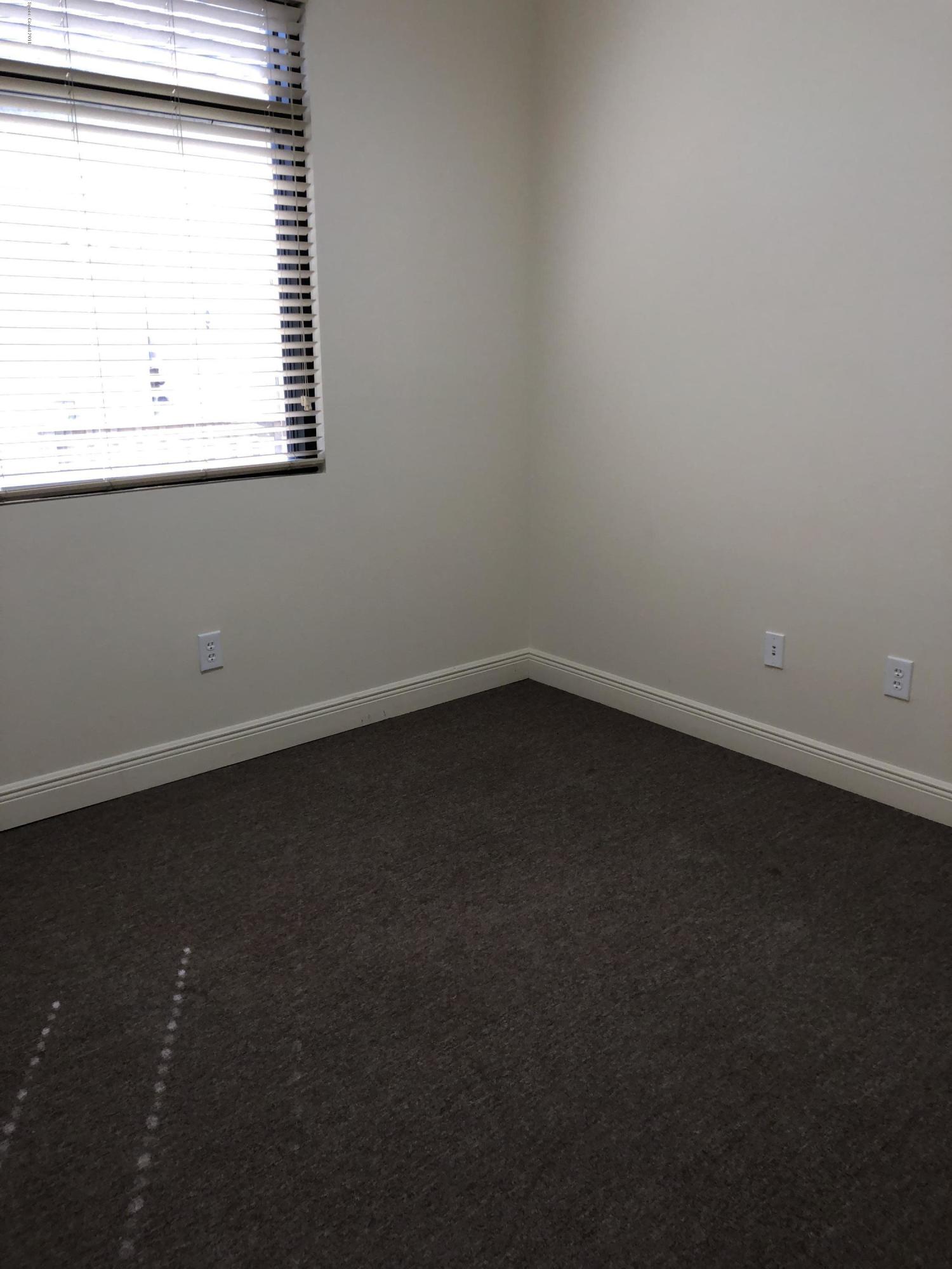 7125 Turner Road, Unit 102 Rockledge, FL 32955 - Photo 3 of 11 an empty room with a window