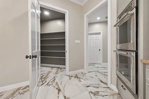 a bathroom with a sink a mirror and a toilet