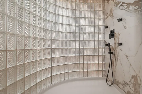 a bathroom with sink and mirror