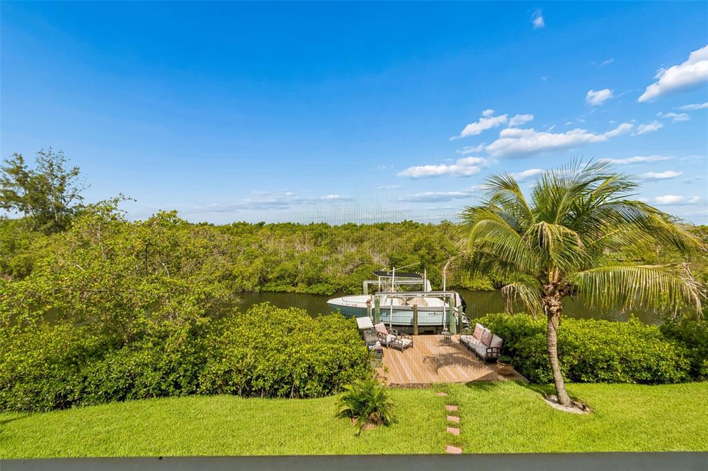 119 Burns Road Terra Ceia, FL 34250 - Photo 68 of 100 a view of a yard with an outdoor seating
