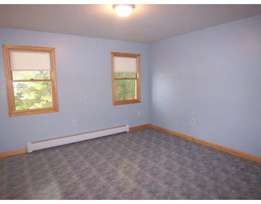 171 Mashapaug Road Holland, MA 01521 - Photo 8 of 9 an empty room with window