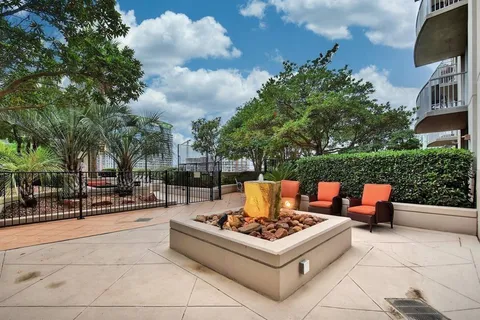 a view of a chairs and tables in the patio
