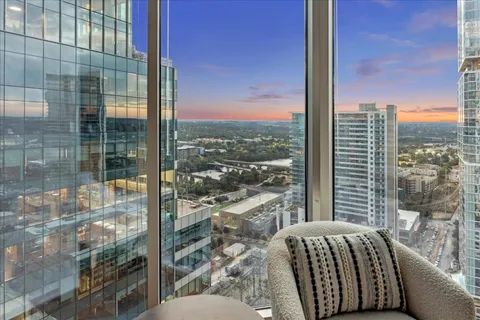 a balcony with a city view