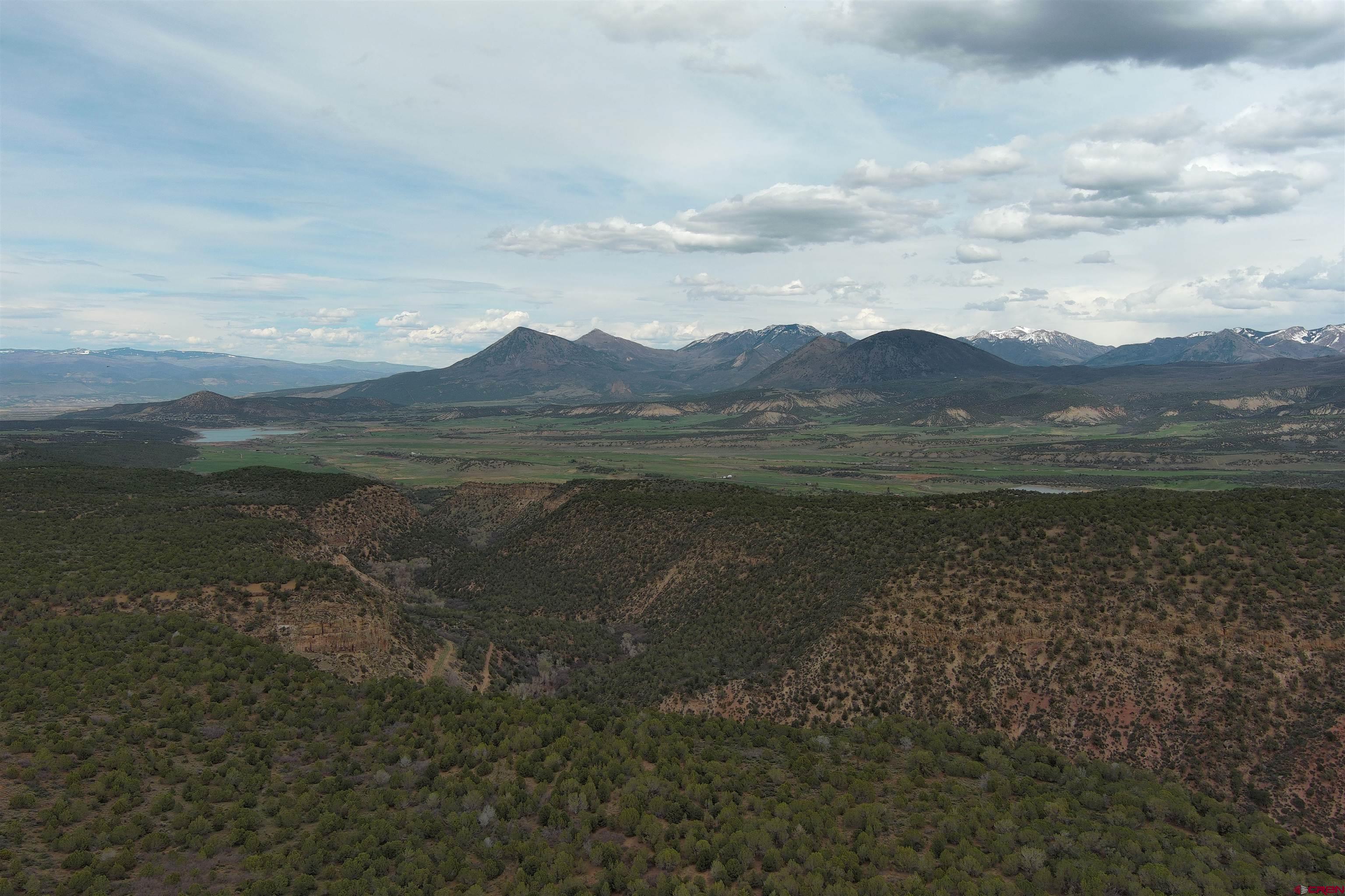 a view of mountain with lake view