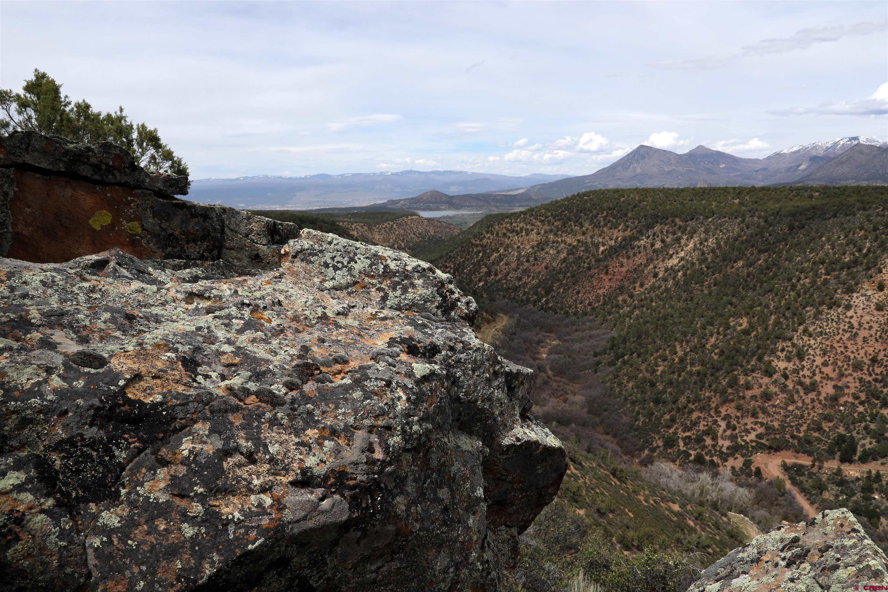 Tbd Blm Road Crawford, CO 81415 - Photo 4 of 6 a view of a lake with mountains in the background