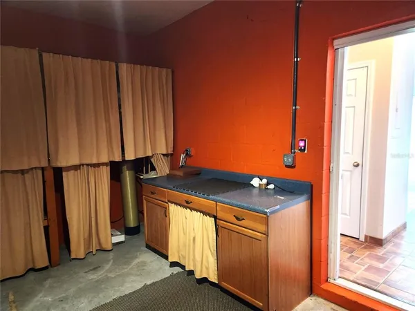 storage and utility room with window