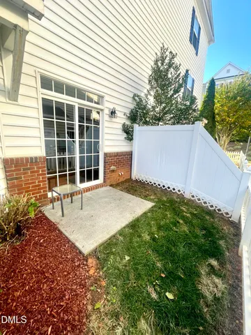 a house view with a backyard space