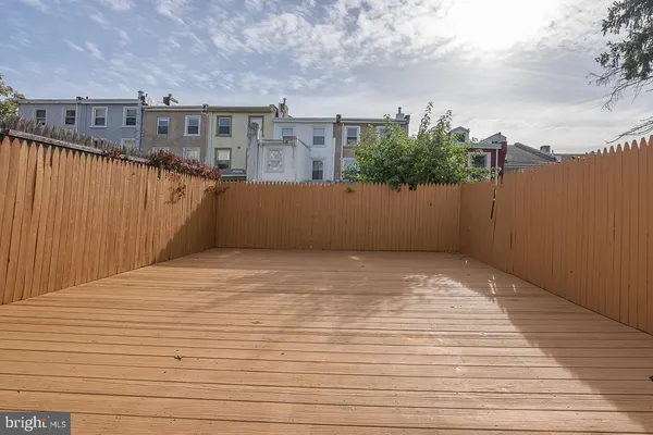 a view of backyard with a table and chair
