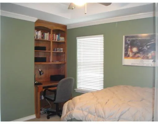 a room with furniture and air hockey table