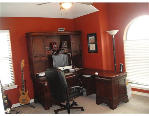 8205 Midwest Circle Corpus Christi, TX 78414 - Photo 6 of 7 a room with furniture and air hockey table