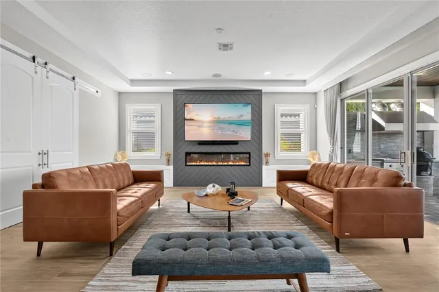 a room with gym equipment and a large window