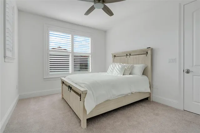 a view of outdoor space with garden and trees