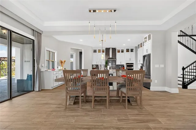 a living room with furniture window and flat screen tv
