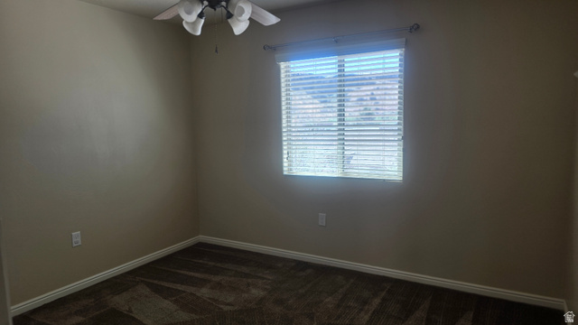 357 East 860 North Hurricane, UT 84737 - Photo 7 of 19 Room with neutral-toned walls, patterned carpet flooring, a window with horizontal blinds, a ceiling fan, and white baseboards