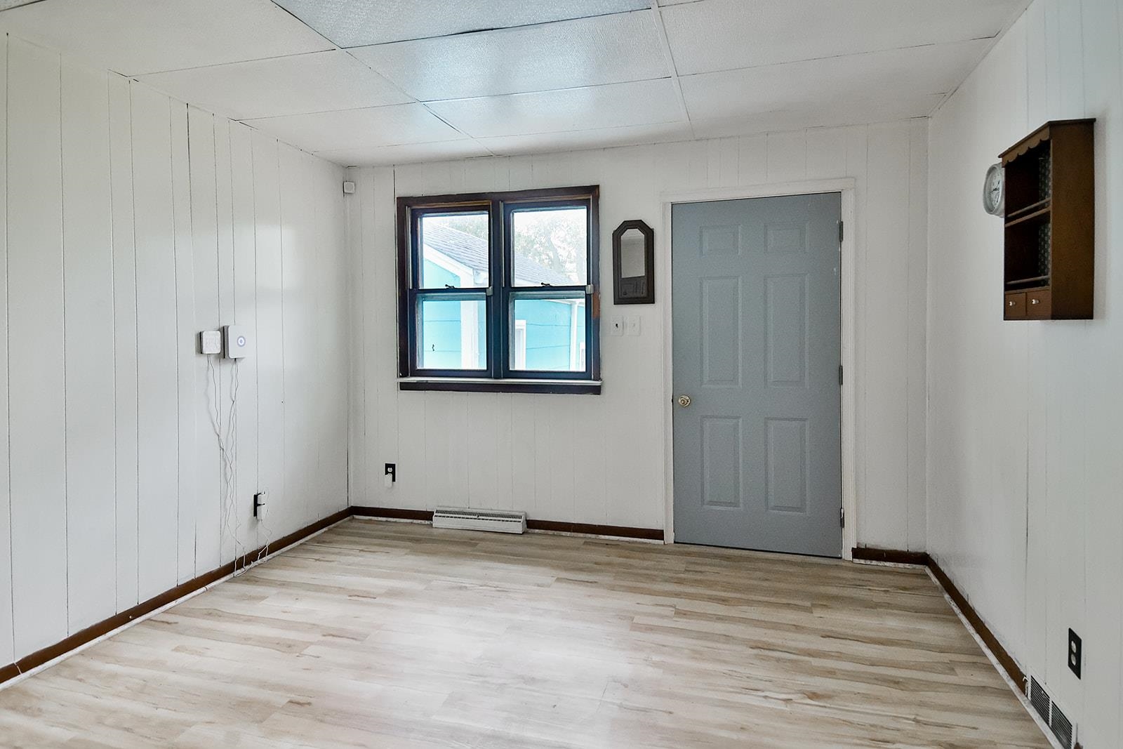 407 Barnum Road Rockford, IL 61109 - Photo 12 of 26 a view of empty room with windows