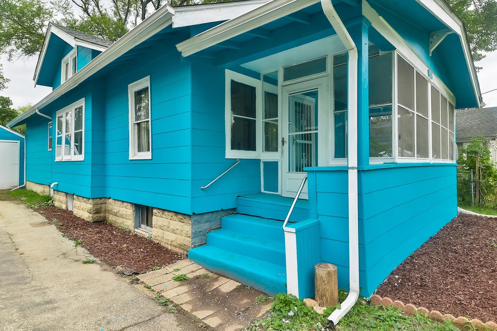 407 Barnum Road Rockford, IL 61109 - Photo 2 of 26 a front view of a house with a yard
