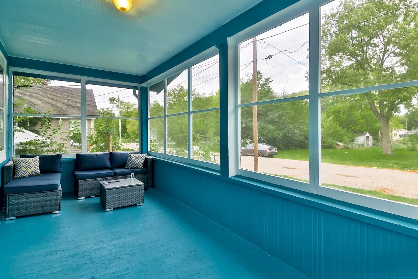 407 Barnum Road Rockford, IL 61109 - Photo 26 of 26 a living room with furniture and floor to ceiling windows