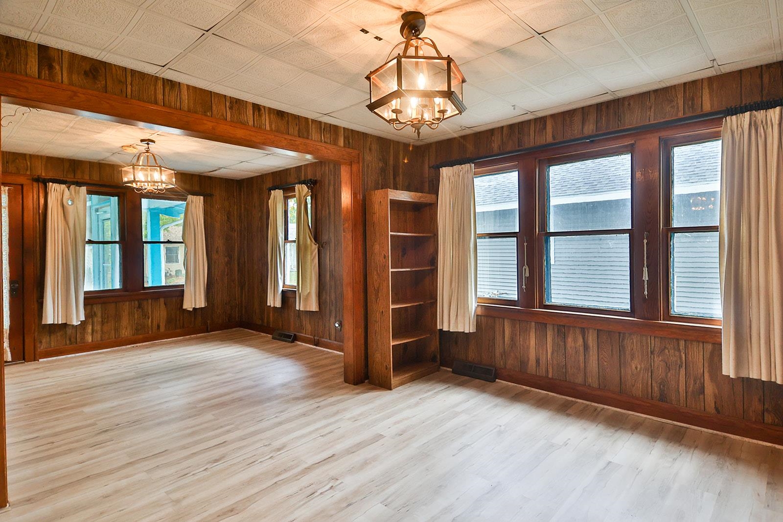 407 Barnum Road Rockford, IL 61109 - Photo 6 of 26 a view of an entryway with wooden floor and windows