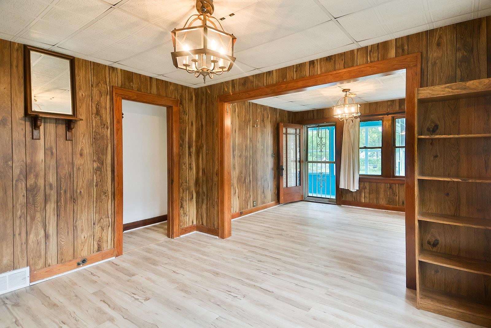 407 Barnum Road Rockford, IL 61109 - Photo 7 of 26 a view of empty room with wooden floor and fan