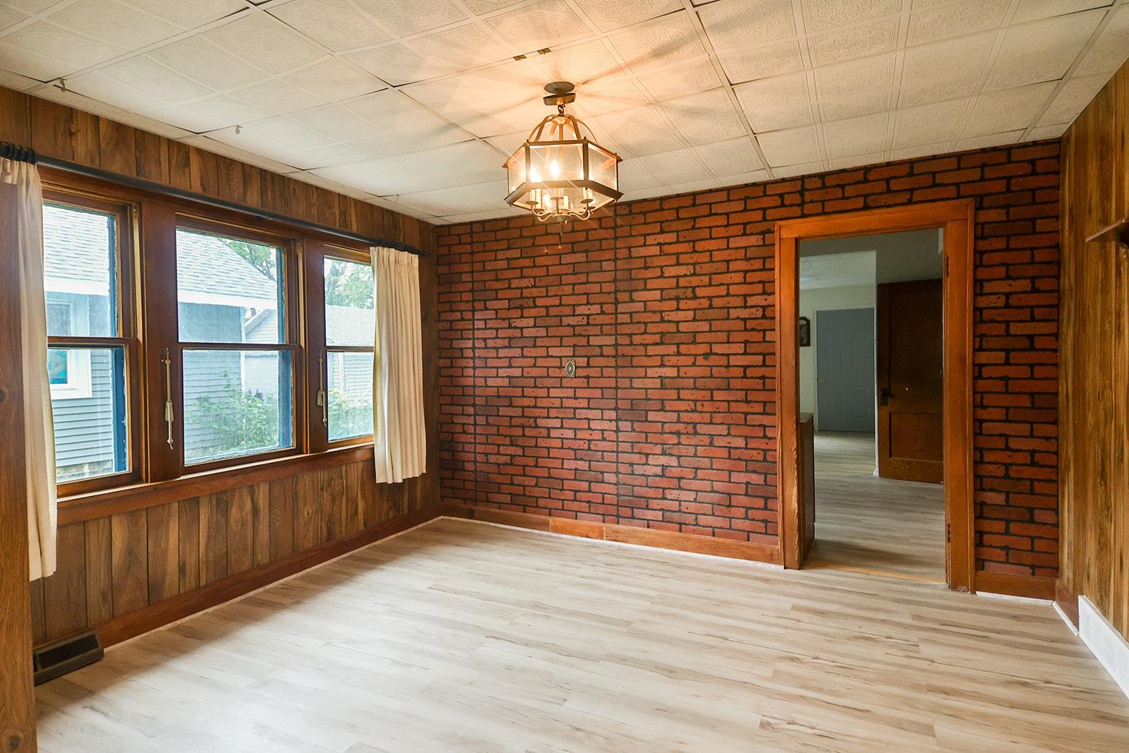 407 Barnum Road Rockford, IL 61109 - Photo 8 of 26 a view of an empty room with a window