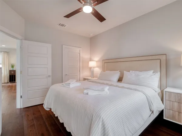 a bedroom with a bed and closet