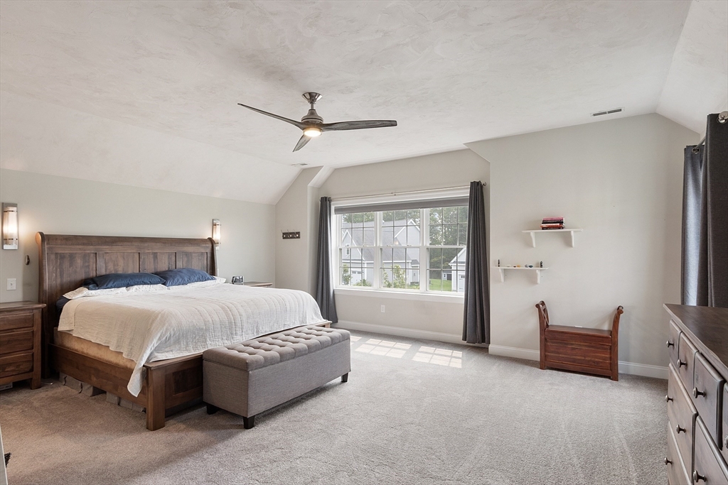 46 Jordan Road Holden, MA 01520 - Photo 17 of 42 a spacious bedroom with a bed and a window