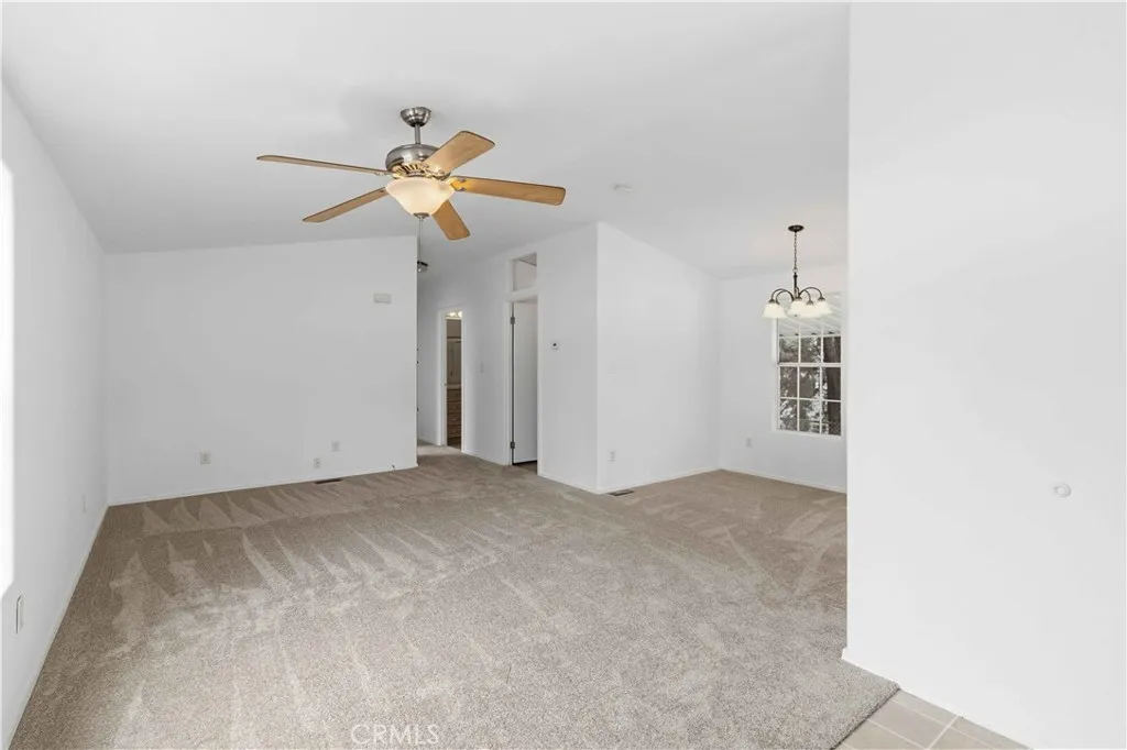 1550 Rory Simi Valley, Unit 133 Simi Valley, CA 93063 - Photo 11 of 29 a view of a room with a ceiling fan and a fan