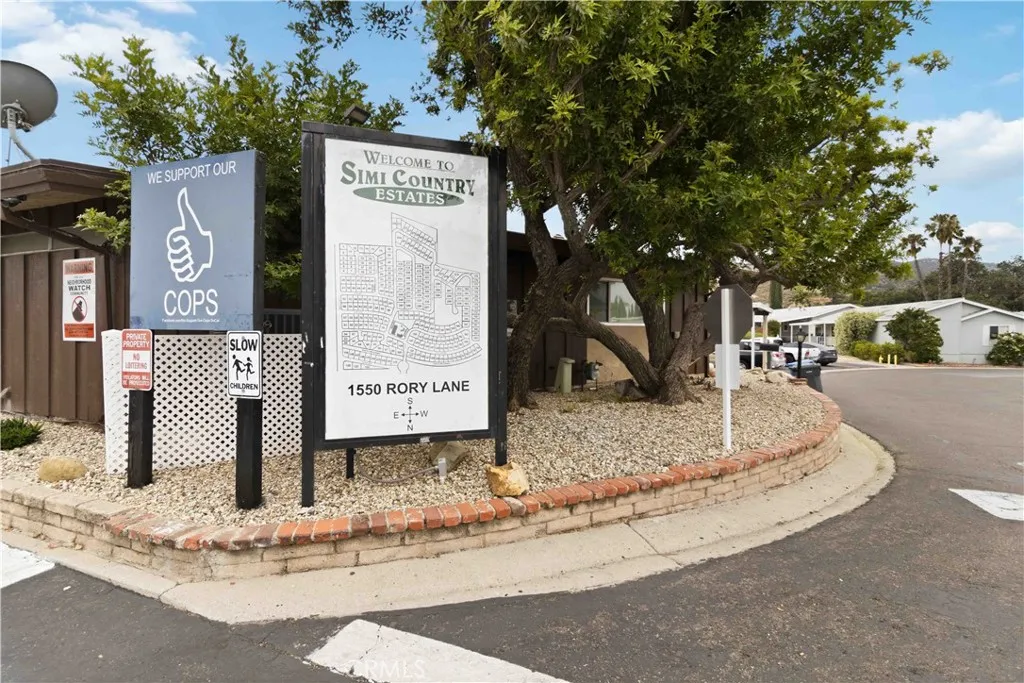 1550 Rory Simi Valley, Unit 133 Simi Valley, CA 93063 - Photo 28 of 29 a sign that is on the side of a road