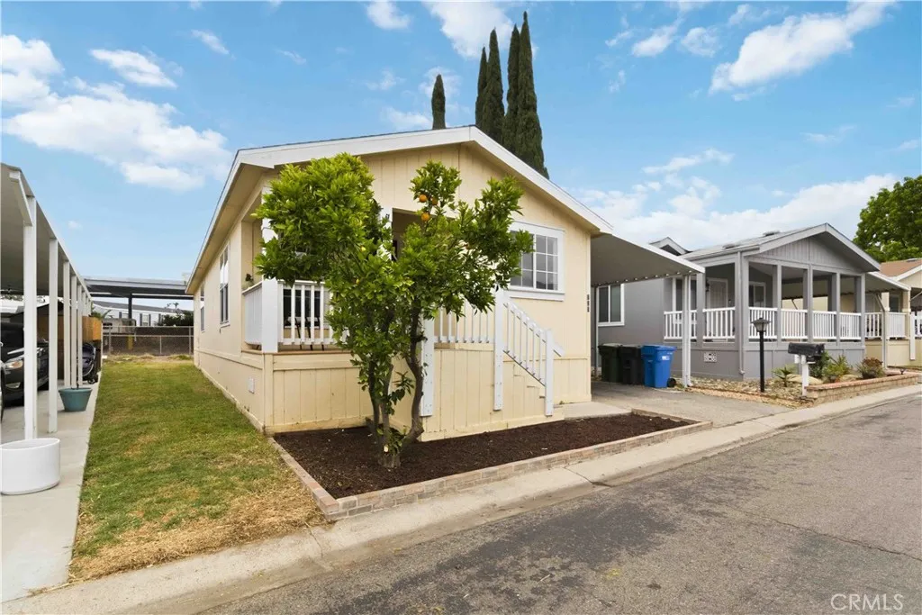1550 Rory Simi Valley, Unit 133 Simi Valley, CA 93063 - Photo 10 of 29 a front view of a house with garden