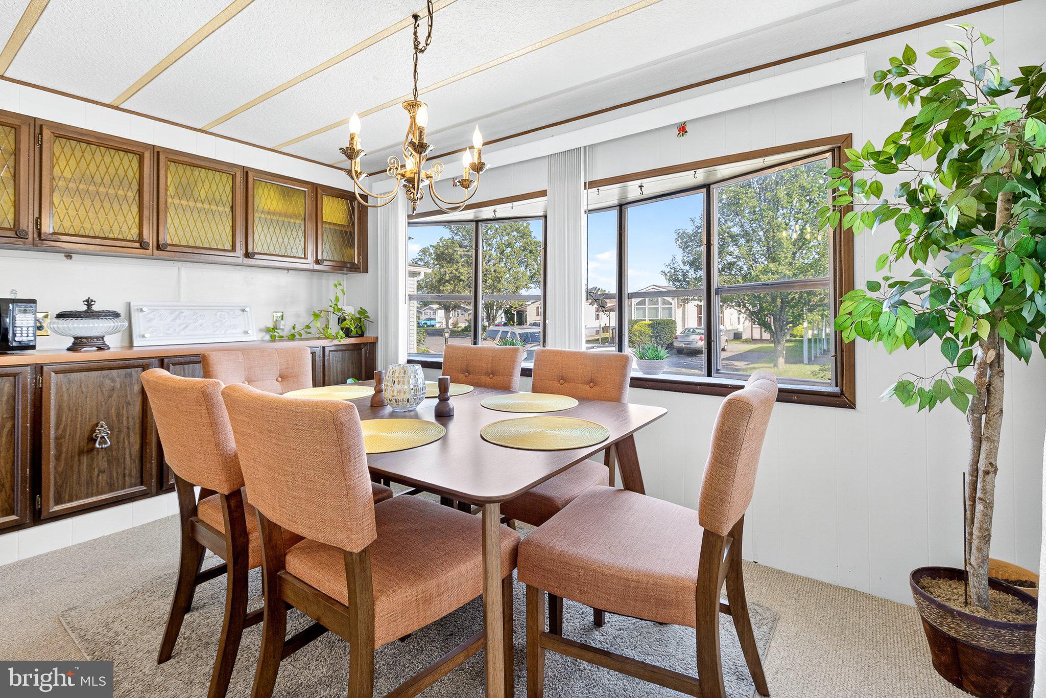 77 Ridgewood Manor Manheim, PA 17545 - Photo 15 of 36 a view of a dining room with furniture window and outside view