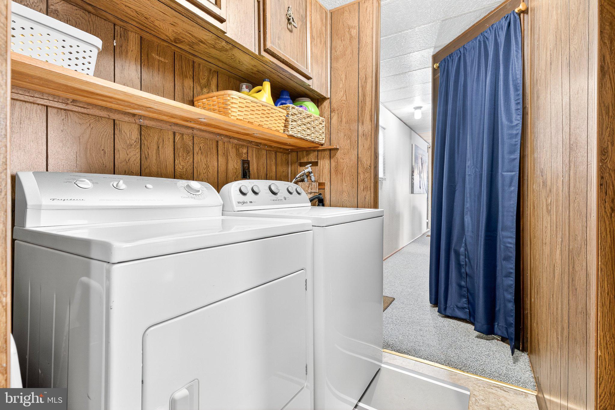 77 Ridgewood Manor Manheim, PA 17545 - Photo 26 of 36 a utility room with dryer and washer